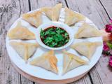 槐花猪肉馅三角煎饺的做法[图]